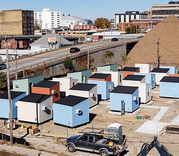 Neighbors Transform Tent Encampment Into Shelter Village