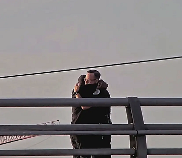 Officer Saves Man on Bridge with Gestures of Gentleness