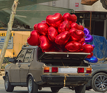 Fifteen Balloons Blocked His Rear Window
