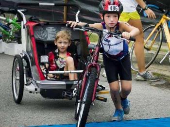 9-yr-old Helps Disabled Brother Finish Triathlons