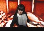 Sand Artist Moves Audiences